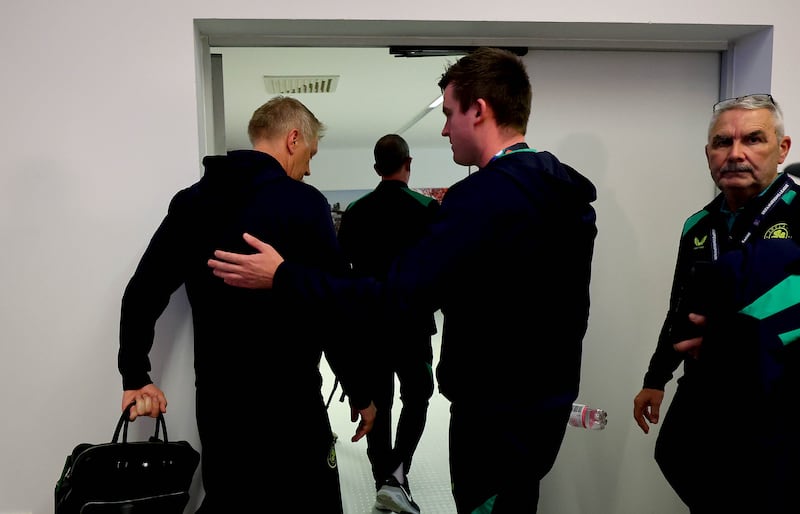 Heimir Hallgrímsson with communications manager Kieran Crowley after the press conference. Photograph: Ryan Byrne/Inpho
