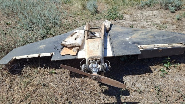 Debris from a Russian drone lies in the grass on August 15, 2026 in Tatarbunary, Odesa Oblast, Ukraine. (Picture: Getty)