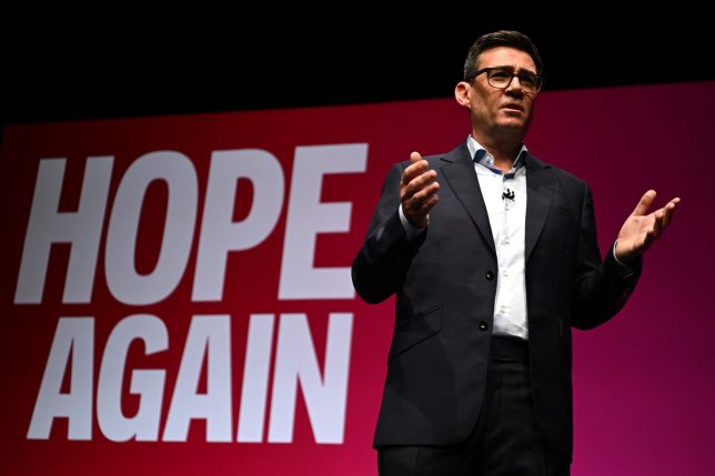 LIVERPOOL, ENGLAND - SEPTEMBER 29: Prime Minister Andy Burnham delivers his keynote speech on day three of the Labour Party Conference at Liverpool Experience Campus on September 29, 2026 in Liverpool, England. Labour enters its annual party conference with a polling boost holding a four-point lead with 27% of the vote under new Prime Minister Andy Burnham. He took over the leadership in July this year and has since driven a turnaround in the party's fortunes. (Photo by Leon Neal/Getty Images)