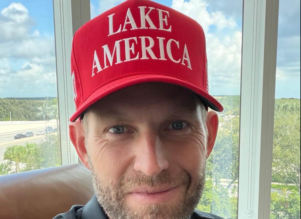 Eric Trump has been slammed for sharing a picture of himself wearing a cap that reads 'Lake America'