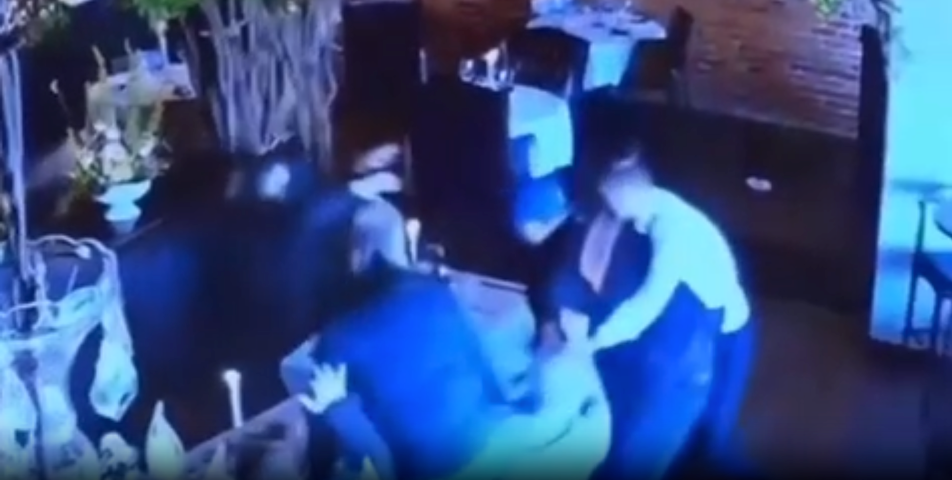 Surveillance footage shows the waiter and restaurant patrons rushing to tackle Matthew Exton to the ground after he pulled the gun on his ex-wife