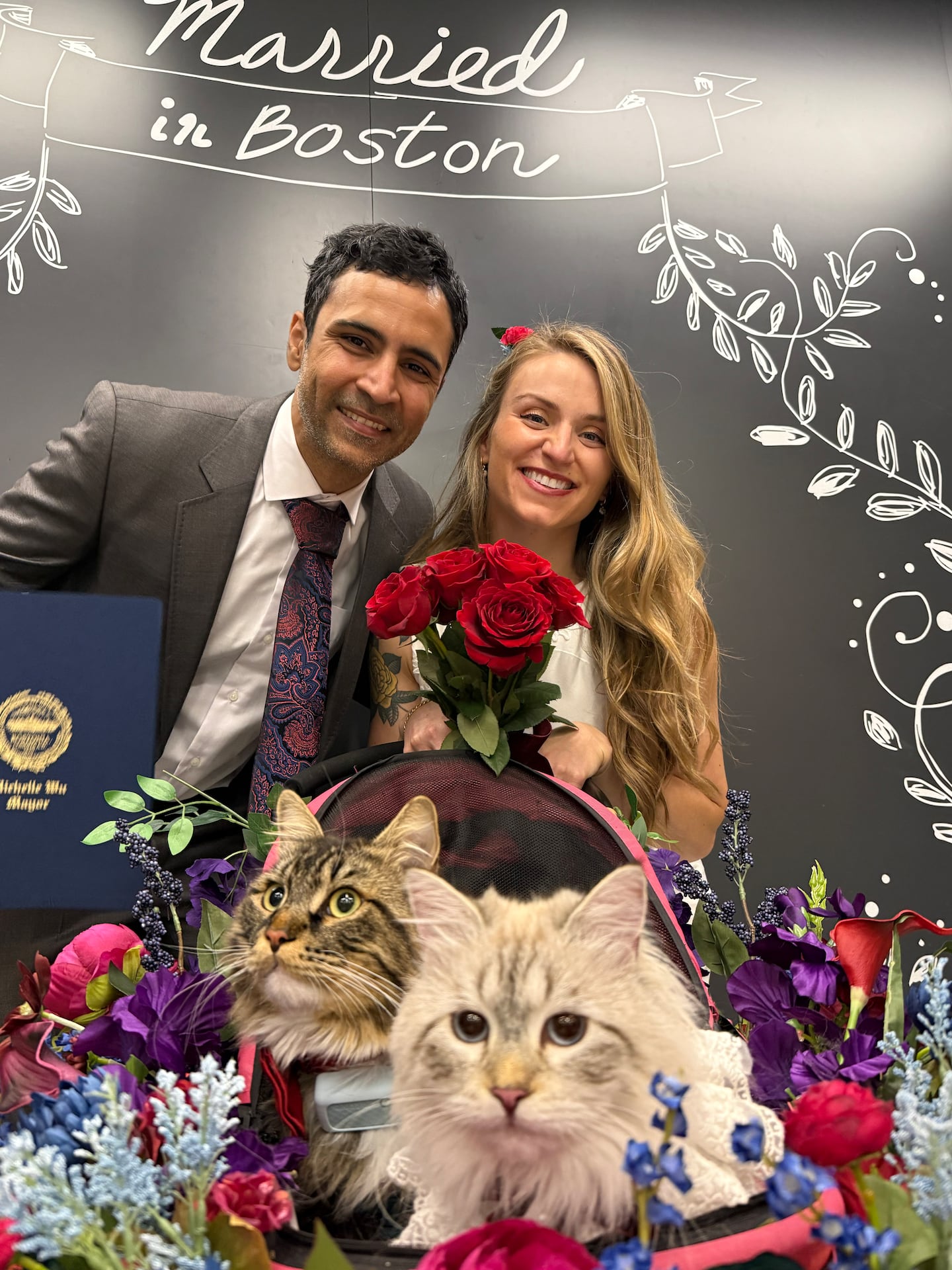 The couple knew they wanted their Siberians, Mishka and Mila, at their legal ceremony at Boston City Hall. “The cats definitely got all the attention,” the bride says. “Mila was wearing white, but I didn’t mind it.”
