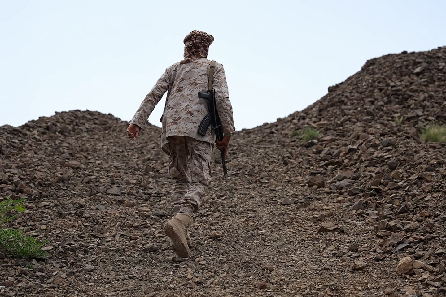 This frame grab taken from AFPTV video footage shows a fighter from the Saudi-backed Nation's Shield Forces deployed in Yemen's Al-Kadha area, west of Taiz province, on Sept. 10, 2026. The Houthis, who control large parts of northwest Yemen, launched a large-scale offensive last week against Yemeni government forces, who are backed by Saudi Arabia.