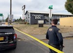 Portland Police officers are on the scene of a “critical incident” in Southeast Portland, Sept.  24, 2026. The area surrounding the Chestnut Tree Inn is cordoned off by police tape.