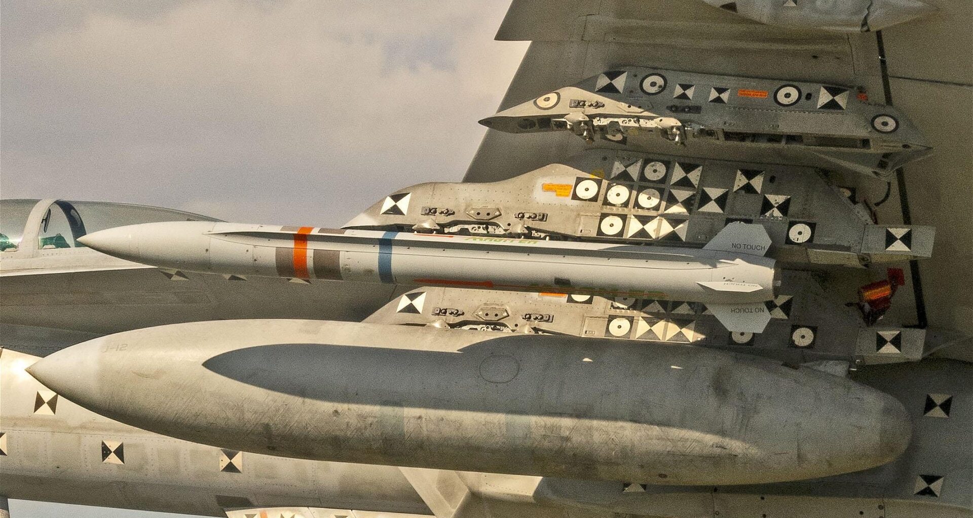 Japan seeks new extended-range missiles in record $55B defense budget request