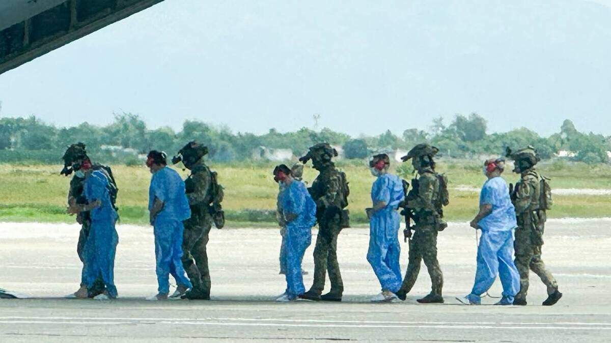 Haiti suspect, 17 Colombians transferred to U.S. custody