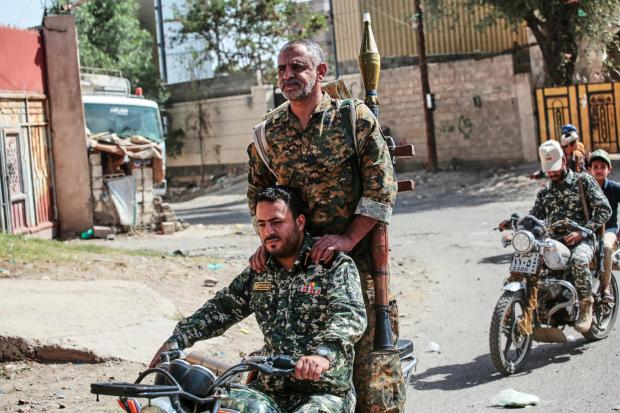 Yemen's Houthi rebels ride a motorbike during a mobilization campaign in Sanaa, Yemen, Thursday, Sept. 10, 2026. (AP Photo)