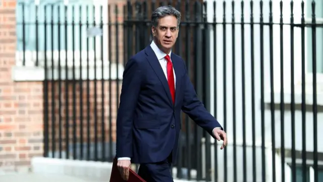 Britain's Foreign Secretary Ed Miliband arrives to attend a cabinet meeting after the summer recess at 10 Downing Street in London