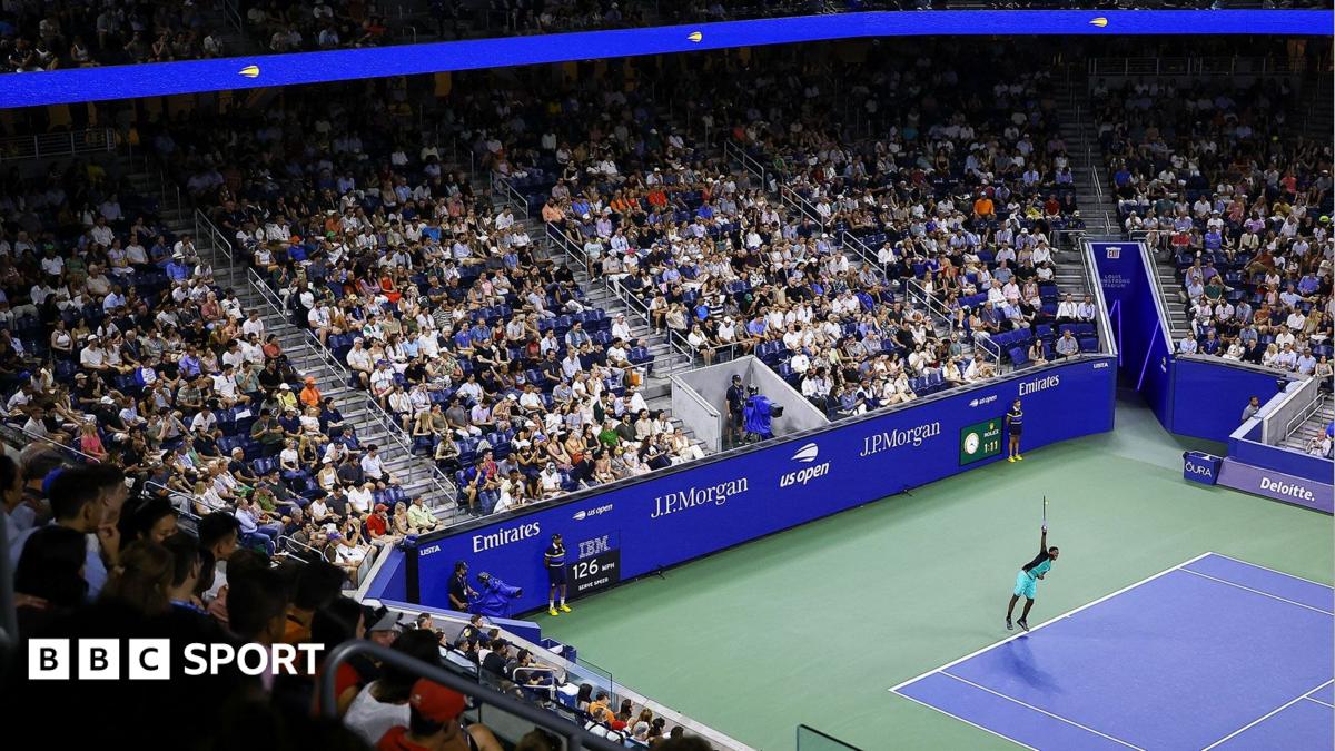 A view above Arthur Ashe Stadium as a light show takes place before the night session