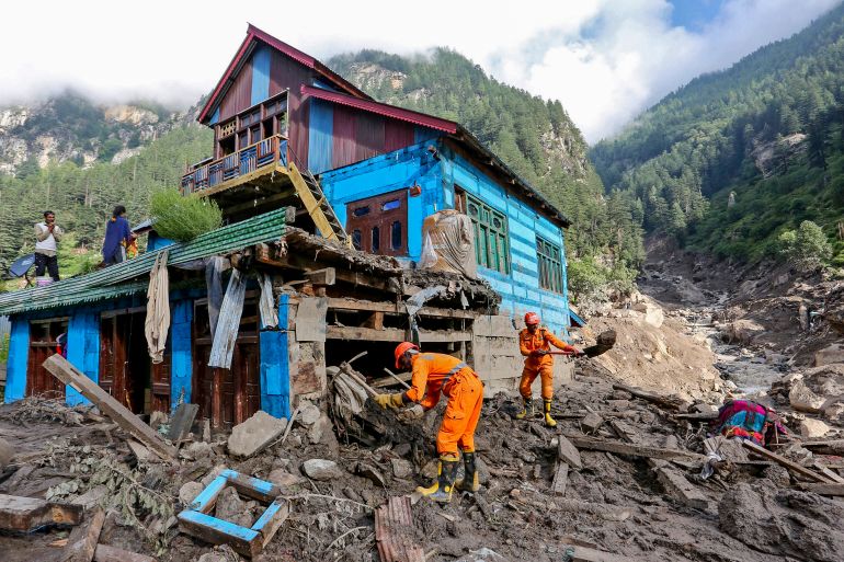 Indian National Disaster Response Force (NDRF) personnel conduct a search and rescue operation at the site of a flash flood at a village in the Kishtwar district of Indian-administered Kashmir on August 16, 2025 [AFP]