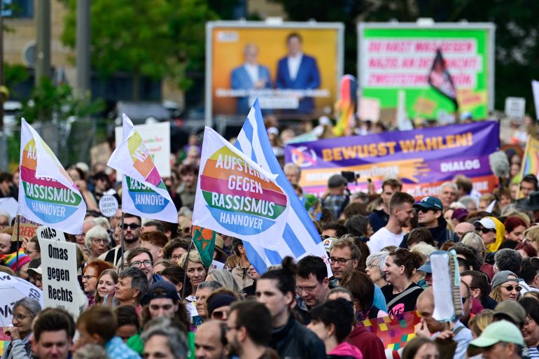 People gather to demonstrate for an open society based on solidarity during a festival of democracy in Magdeburg, eastern Germany, on September 5, 2026, one day before regional elections in the eastern federal state of Saxony-Anhalt.