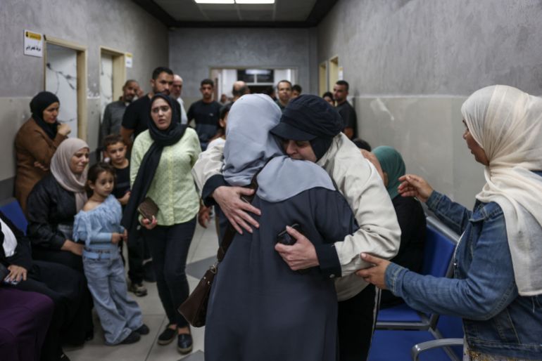 Relatives mourn during the funeral of two Palestinians killed in Al-Mughayyir, east of Ramallah, following an Israeli settler attack and subsequent Israeli army raid, at the Ramallah government hospital in the occupied West Bank on September 2, 2026.