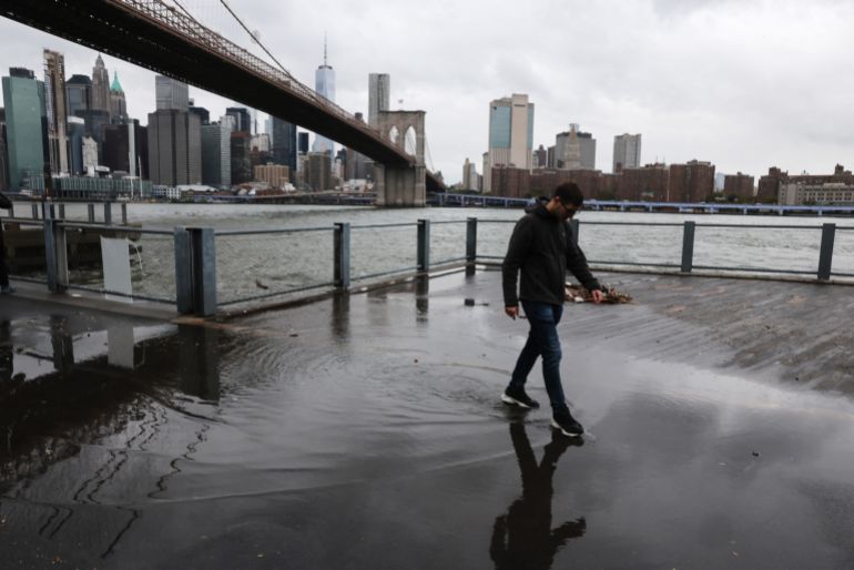 NEW YORK CITY - SEPTEMBER 26: Large puddles and debris line a walkway in the Dumbo neighborhood in Brooklyn as a Nor'easter storm moves through the area on September 26, 2026 in New York City. New York and much of the Northeast expect a weekend of high winds, rain, and possible flooding in coastal communities as the storm passes through. Spencer Platt/Getty Images/AFP (Photo by SPENCER PLATT / GETTY IMAGES NORTH AMERICA / Getty Images via AFP)
