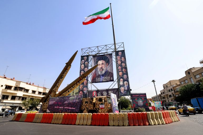 Iranian-made Zolfaghar missiles are seen on display beside a large portrait of Iran’s Supreme Leader Mojtaba Khamenei at Baharestan Square in Tehran on September 28, 2026 [AFP]