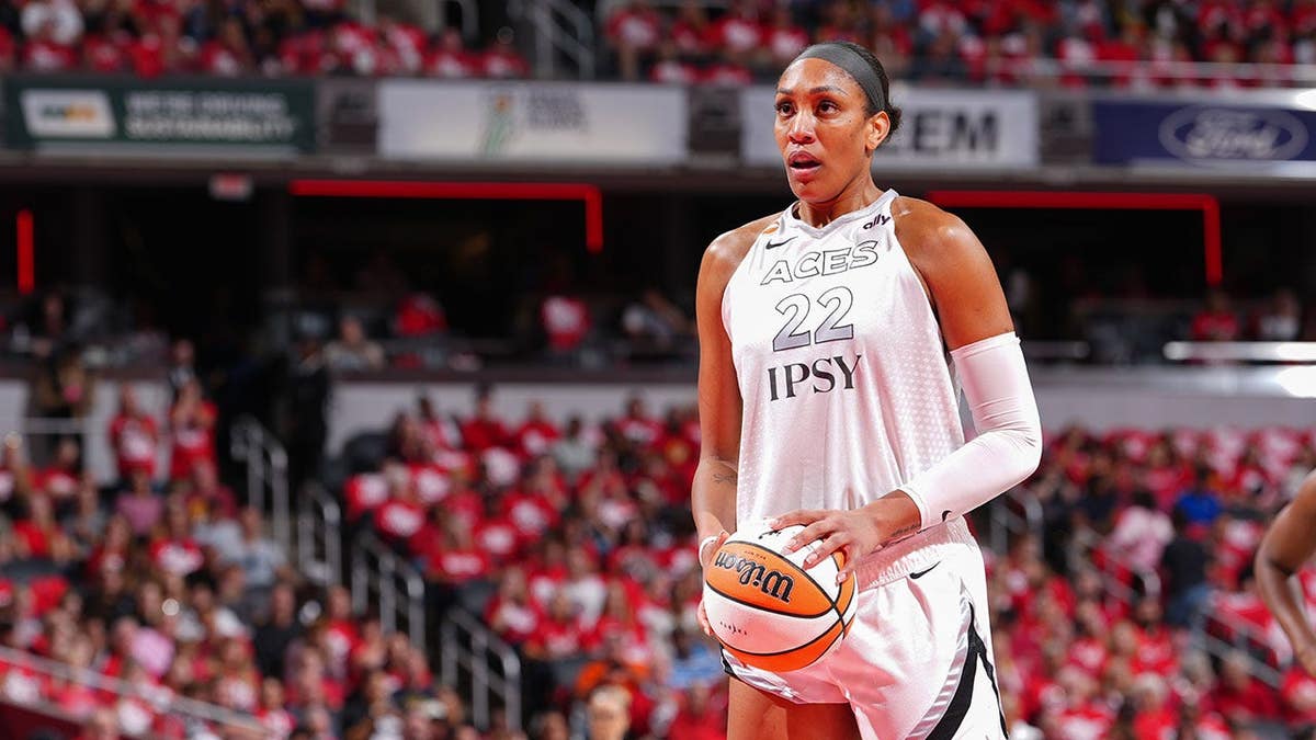 A'ja Wilson of the Las Vegas Aces prepares to shoot a free throw during a WNBA playoff game.