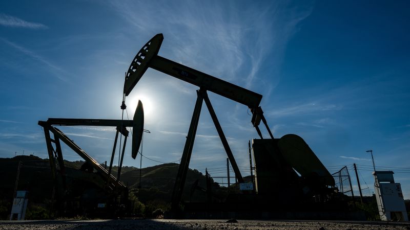 Global oil prices hit $100 per barrel as Middle East conflict roils markets