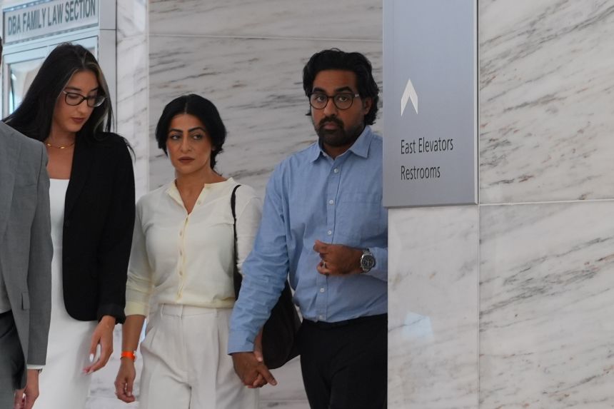 Omar Ahmed and his wife Nausheen Gilkar arrive for a court hearing in Dallas, Texas, on August 25.