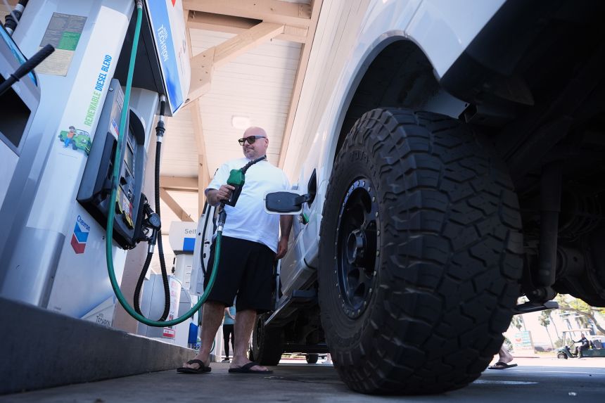 A gas station customer puts $175 of diesel in his truck on September 10, 2026, in Carlsbad, California.