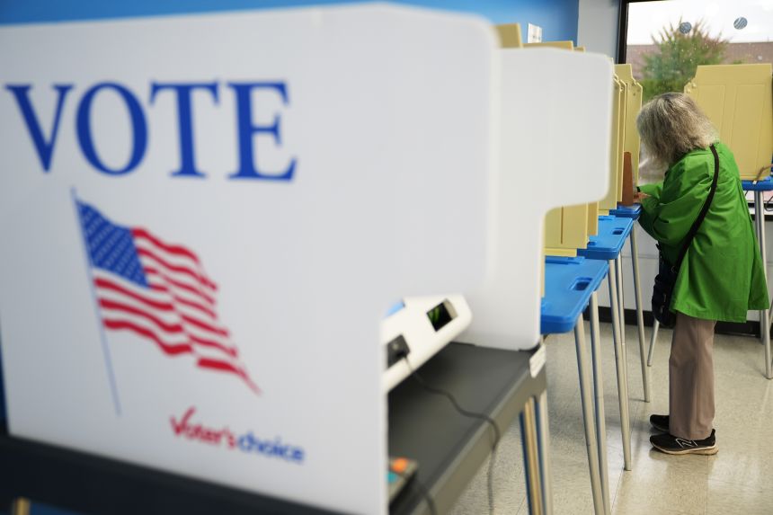 A voter cast a ballot on the first day of early voting in Minnesota on September 18 in Minneapolis.