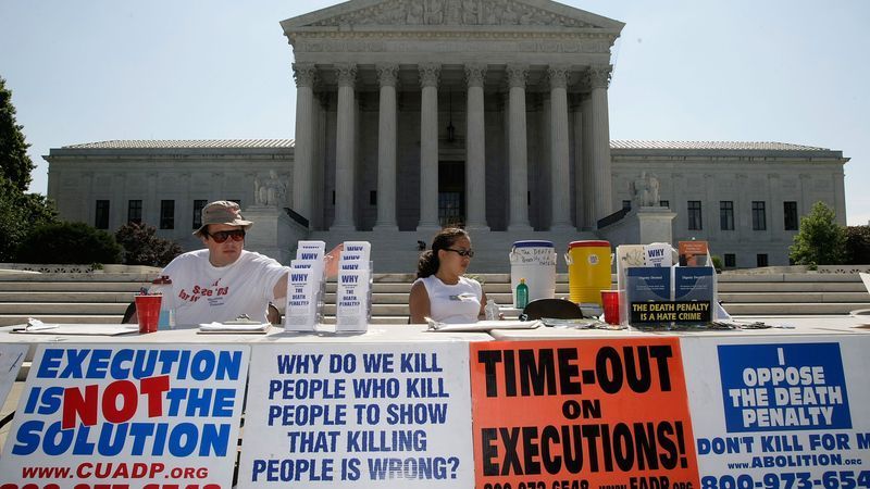 WASHINGTON - JULY 01: Activists participate in a vigil against the death penalty in front of the U.S. Supreme Court July 1, 2008 in Washington, DC. The Abolitionist Action Committee and the National Coalition to Abolish the Death Penalty held the vigil to abolish the death penalty to mark the 1972 and 1976 Supreme Court rulings suspending the death penalty and later allowing executions to resume. (Photo by Alex Wong/Getty Images)