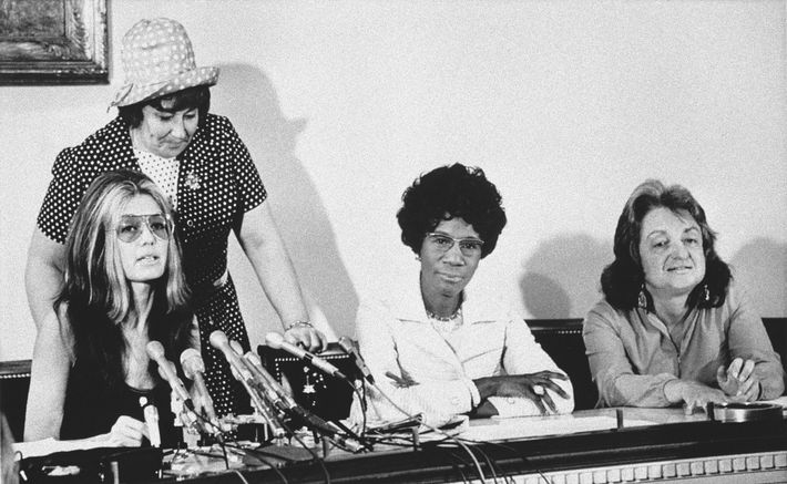 1971: Steinem with Shirley Chisholm and Betty Friedan. Standing is Bella Abzug.