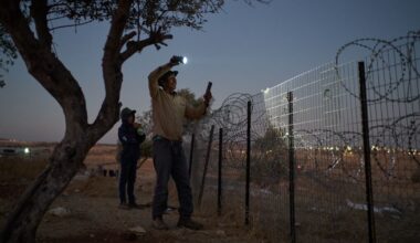 A flashlight and unseen settlers: Photographer conveys West Bank family's nightly watch in 1 photo :: WRAL.com