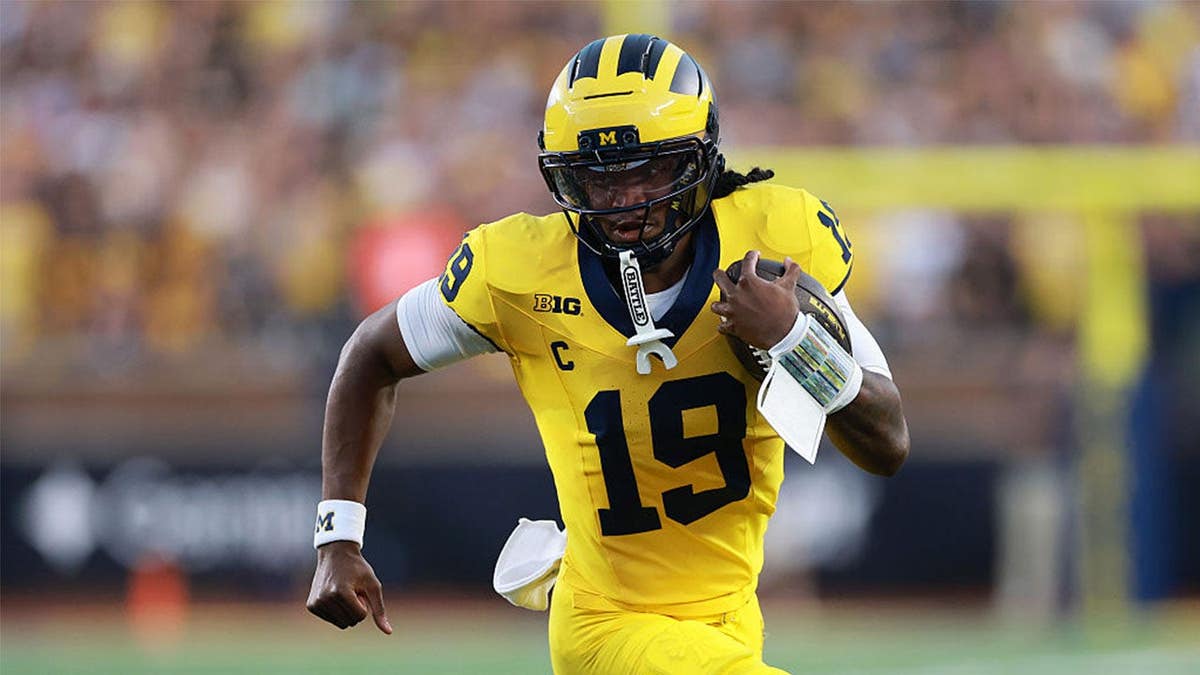 Bryce Underwood #19 of the Michigan Wolverines