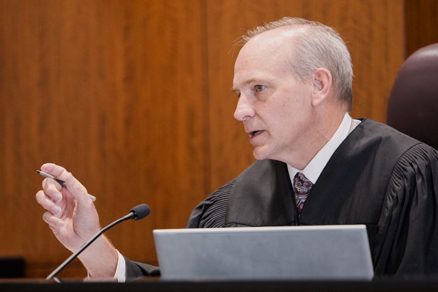 Fourth District Judge Derek Pullan presides over a hearing for Douglas Carter in 4th District Court in Provo, Utah, in April.