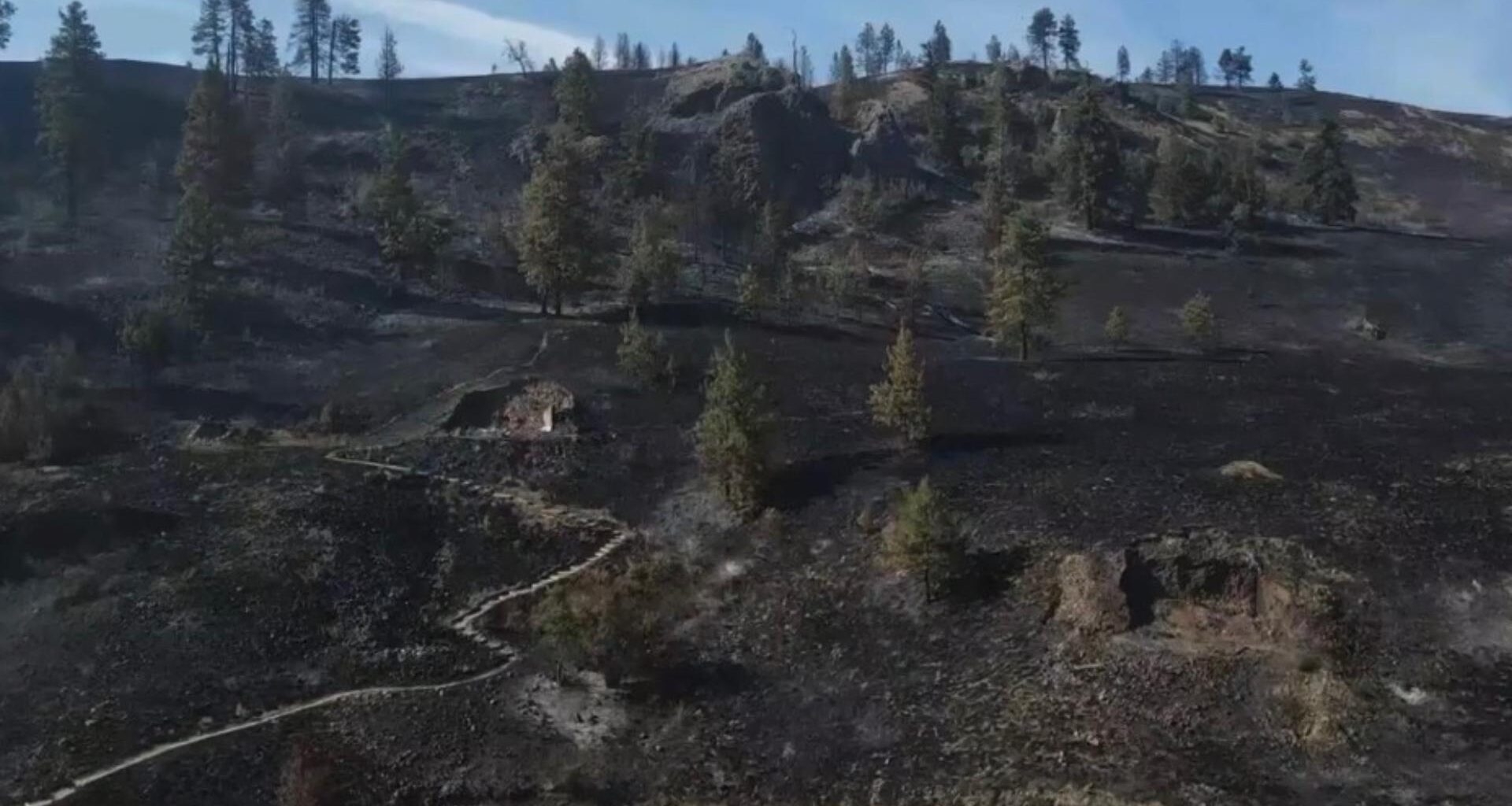Suspect in Chelan Hills Fire arrested, facing multiple charges, says Douglas County sheriff