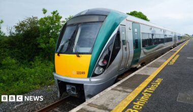 An Irish Rail train on a platform.