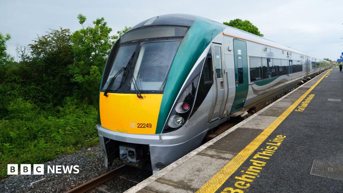 An Irish Rail train on a platform.