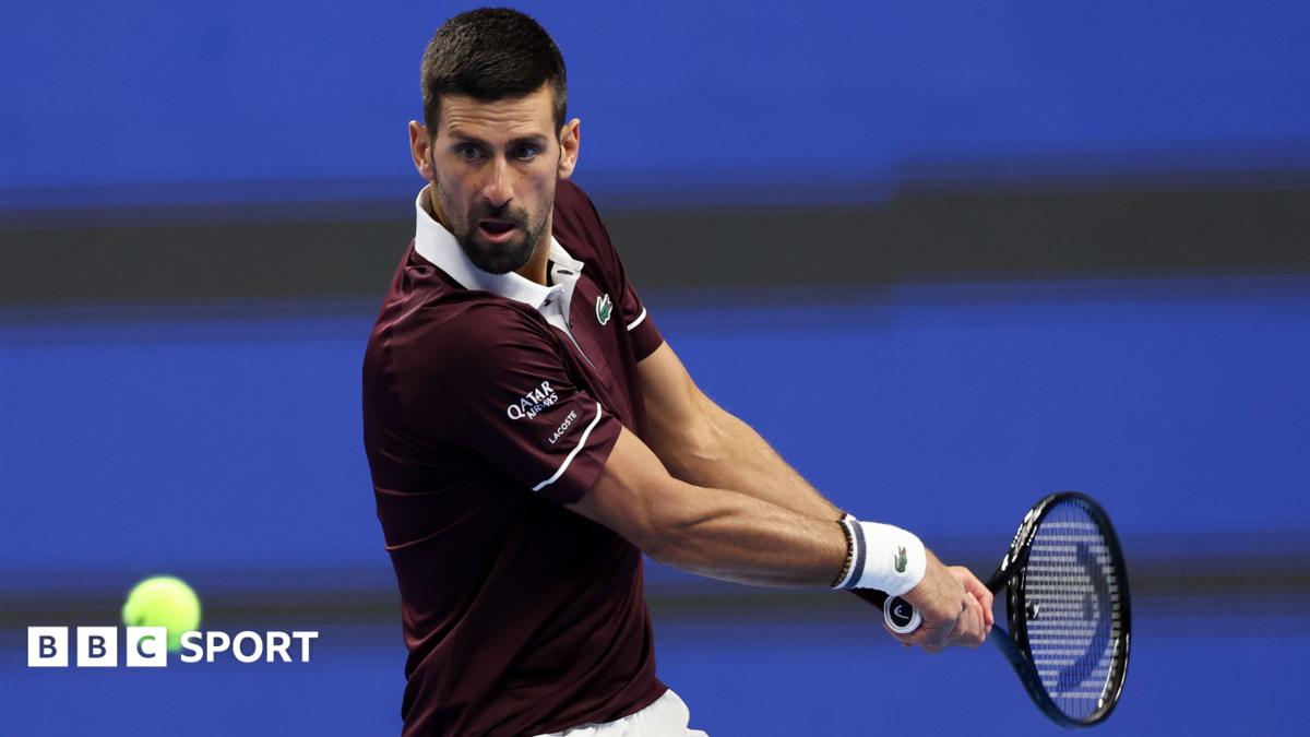 Novak Djokovic plays a backhand at the China Open in Beijing