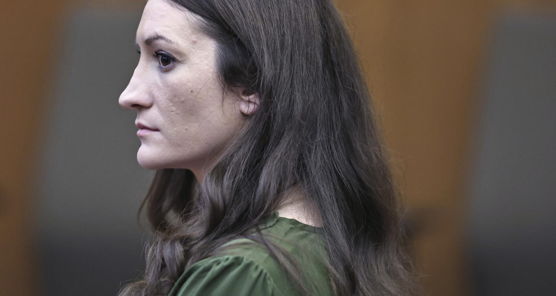 Lindsay Clancy watches jury members as Judge William Sullivan polls them during her murder trial at Plymouth Superior Court on Aug. 31. (Greg Derr/The Patriot Ledger via AP, Pool)