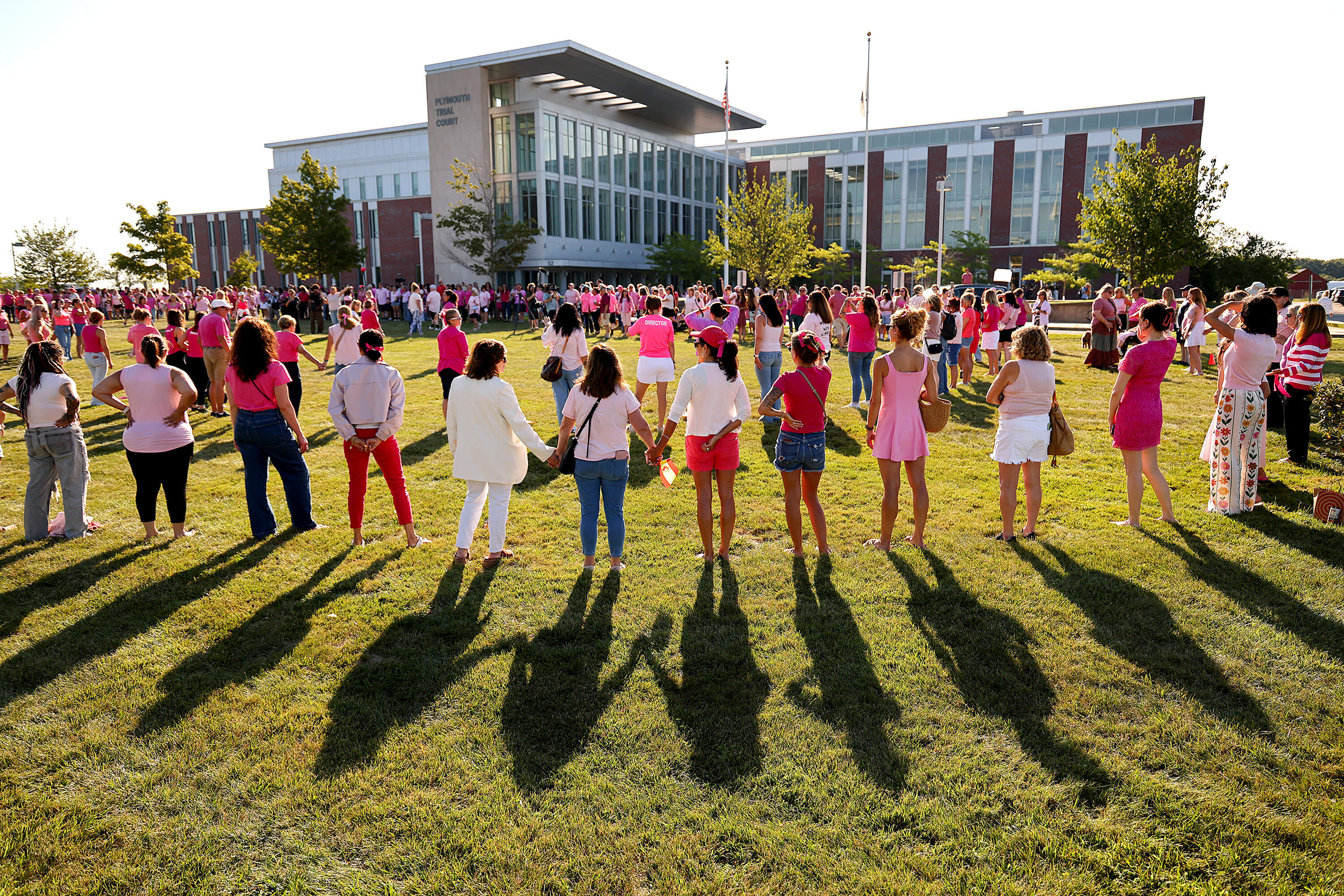 Clad in pink, supporters of Lindsay Clancy gathered outside of Plymouth Superior Court on Aug. 20. (John Tlumacki/The Boston Globe via Getty Images)