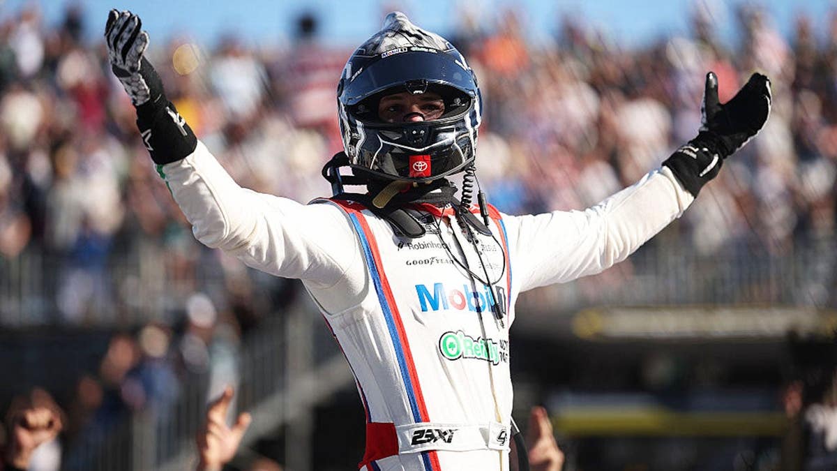 Corey Heim celebrates after winning the NASCAR Cup Series Anduril 250 at Naval Base Coronado.