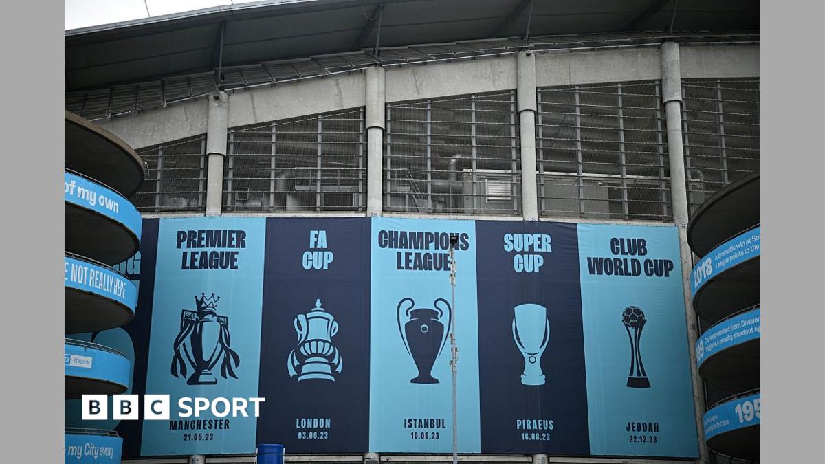Images of trophies won are pictured outside the Etihad Stadium, the home ground of Manchester City football club