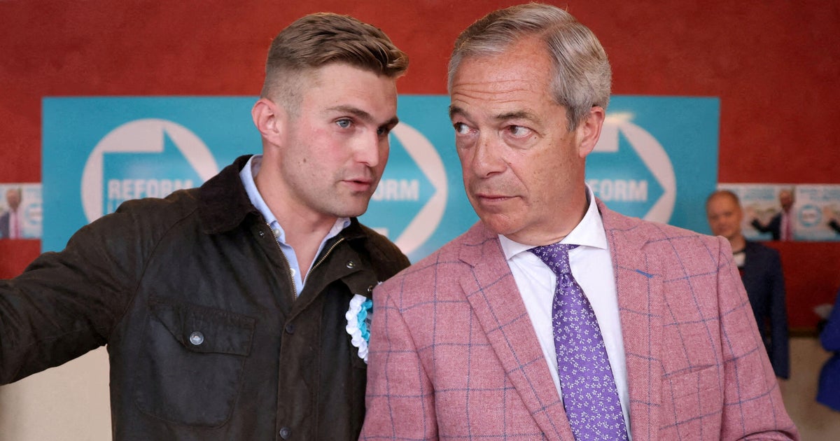 Dan Jukes speaks to Reform UK party leader Nigel Farage in Clacton-on-Sea, Britain, July 2, 2024.