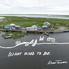 Bertha and Wilson Twitchell stand outside their home in Kasigluk, Alaska. Wilson grew up here. He drew an image of what the land looked like when he was young: Grass and dry land surrounded the house, stretching at least 80 feet to the riverbank, where he remembers playing with toy boats. Now, when the water is particularly high, the house is nearly an island.