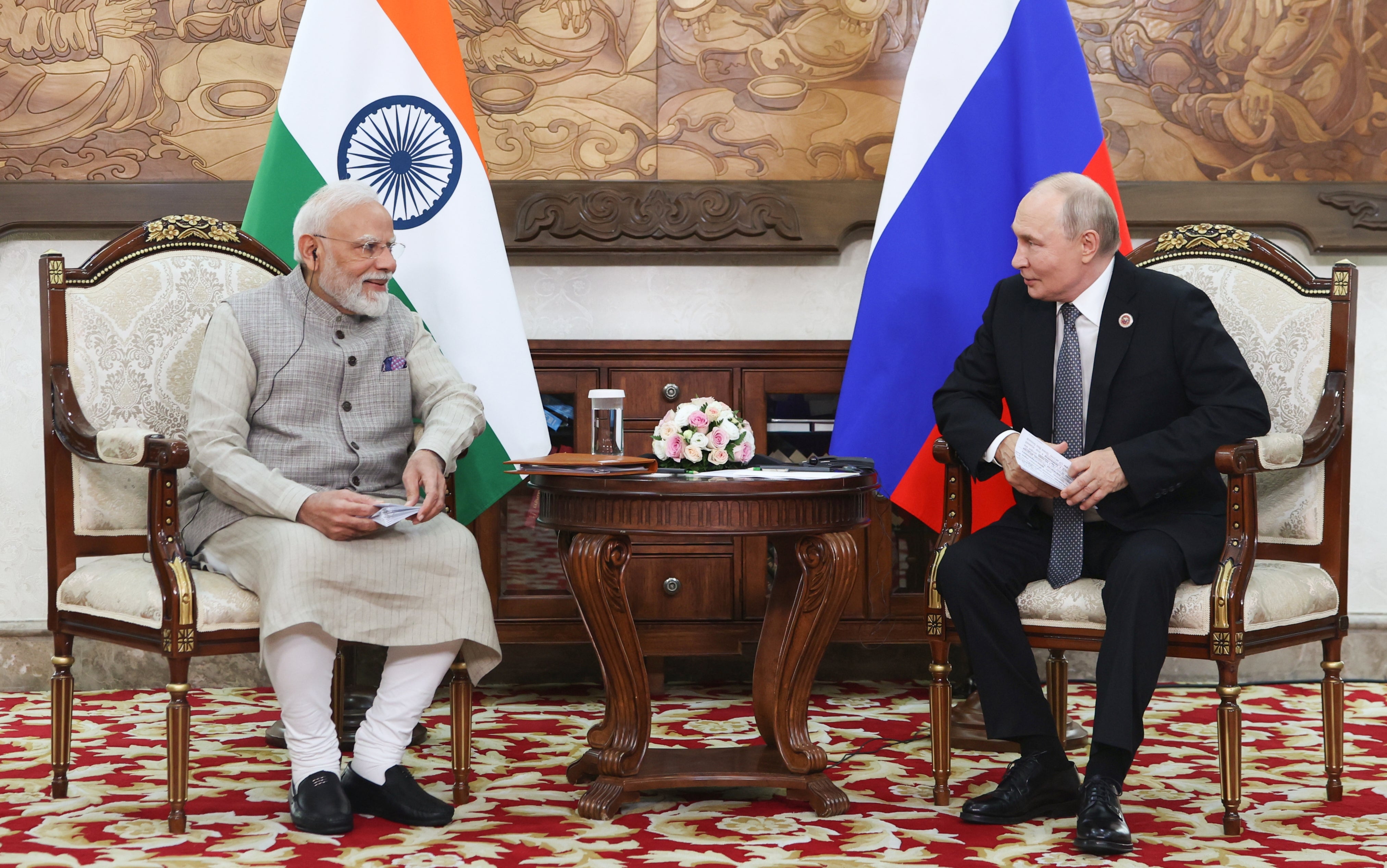 Russian President Vladimir Putin, right, and Indian Prime Minister Narendra Modi talk during their meeting on the sidelines of the Shanghai Cooperation Organization in Bishkek, Kyrgyzstan, on Monday, Aug. 31, 2026