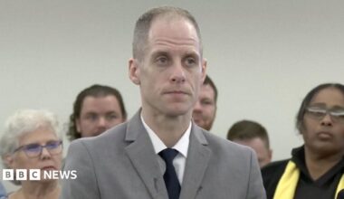 Caleb Flynn, accused of murdering his wife in February, sits before an Ohio judge in court