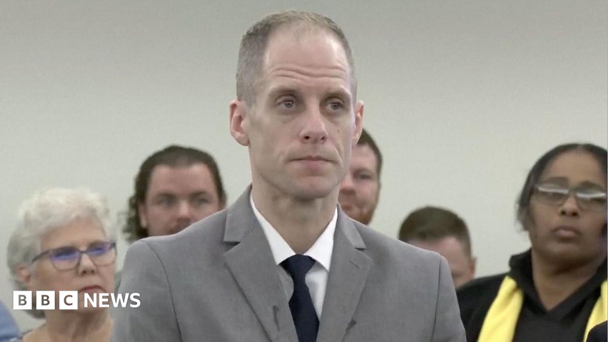 Caleb Flynn, accused of murdering his wife in February, sits before an Ohio judge in court