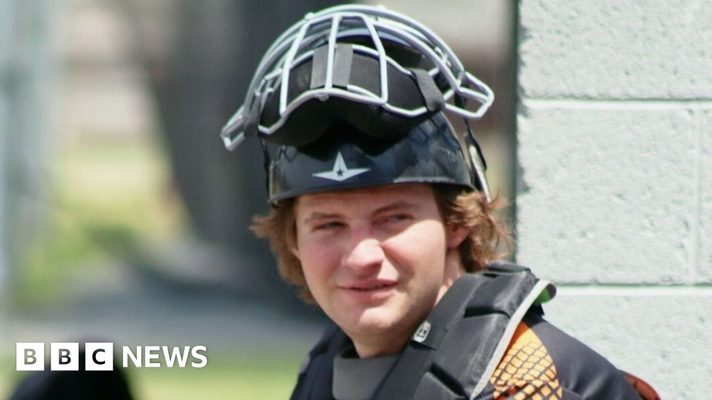 Pennsylvania officer charged in death of student who knocked at wrong door - BBC