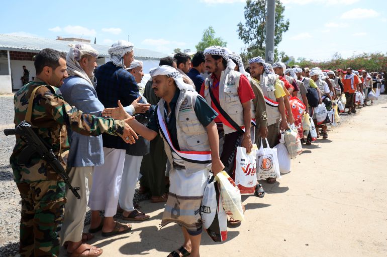 epa13234647 Freed Houthi prisoners are greeted by Houthi officials after being released from government forces-run detention centers, in Sana'a, Yemen, 12 September 2026. Houthi forces freed 200 fighters, who were imprisoned by government forces in southwestern Yemen, after seizing the Red Sea port city of Mokha from retreating Yemeni government troops during an offensive near the Bab Al-Mandab Strait. EPA/YAHYA ARHAB