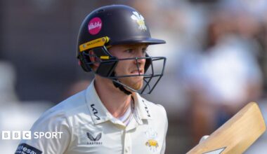 Josh Blake wearing a Surrey helmet