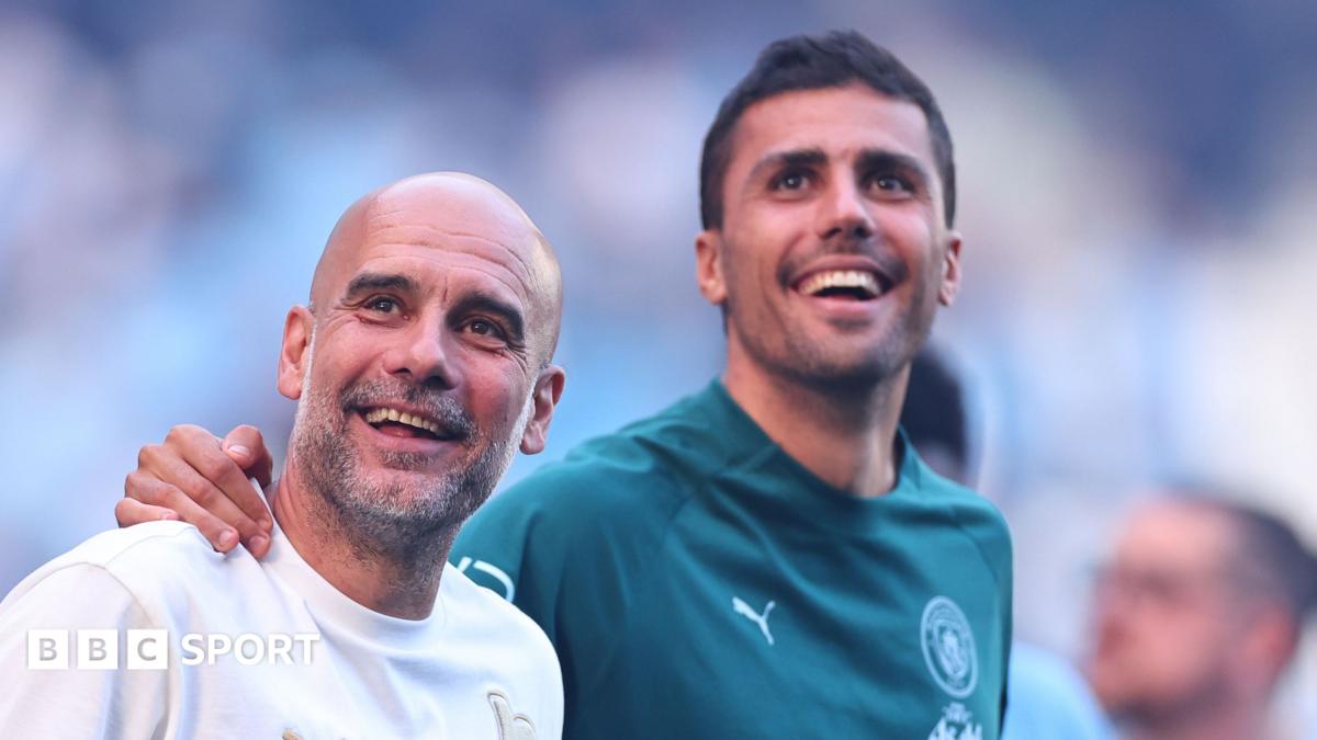 Ex-Manchester City midfielder Rodri and manager Pep Guadiola