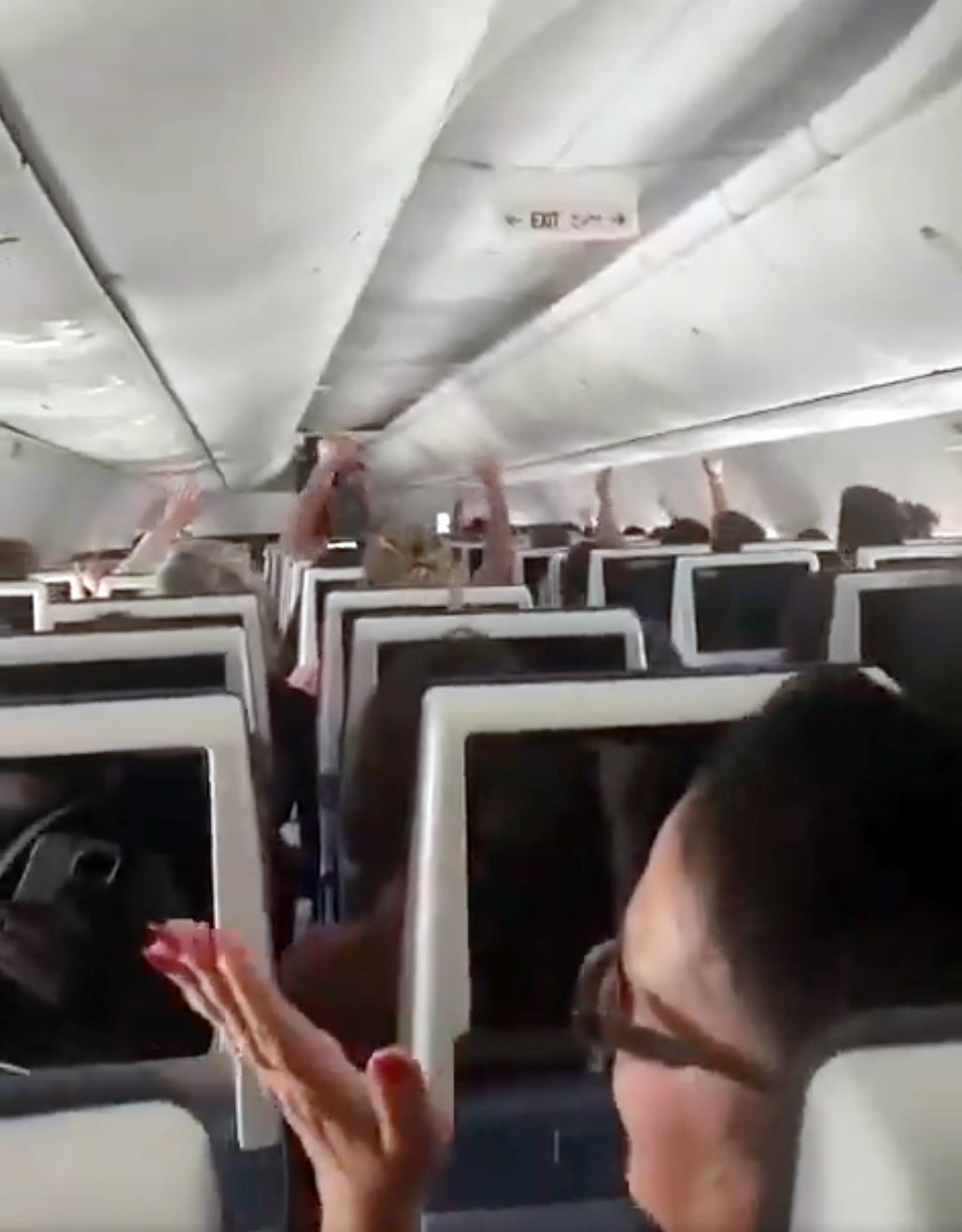 Passengers on FlyDubai flight applaud after flight is safely landed on diversion in Saudi Arabia after alleged attempted hijacking Israel