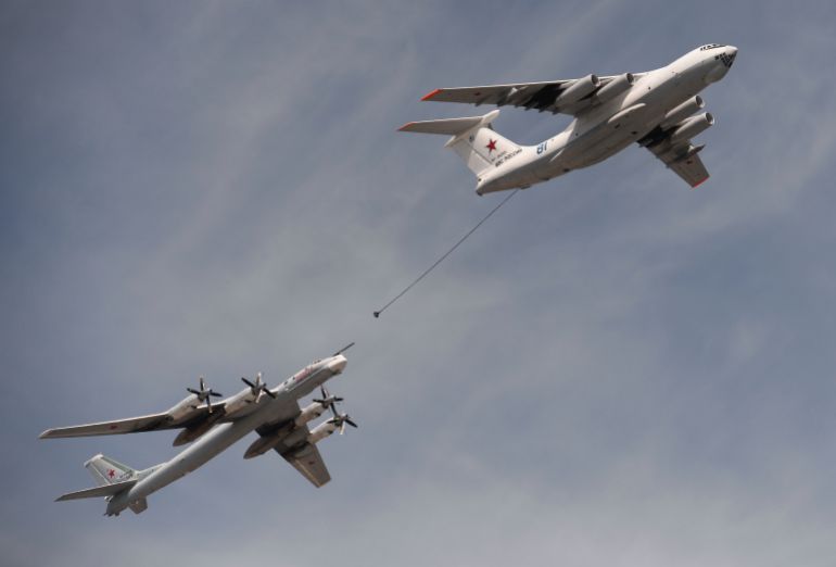 MOSCOW, RUSSIA - MAY 9: In this handout image supplied by Host photo agency / RIA Novosti, An Ilyushin Il-78 Midas air force tanker and a Tupolev Tu-95MS Bear strategic bomber during the military parade to mark the 70th anniversary of Victory in the 1941-1945 Great Patriotic War, May 9, 2015 in Moscow, Russia. The Victory Day parade commemorates the end of World War II in Europe. (Photo by Host photo agency / RIA Novosti via Getty Images)