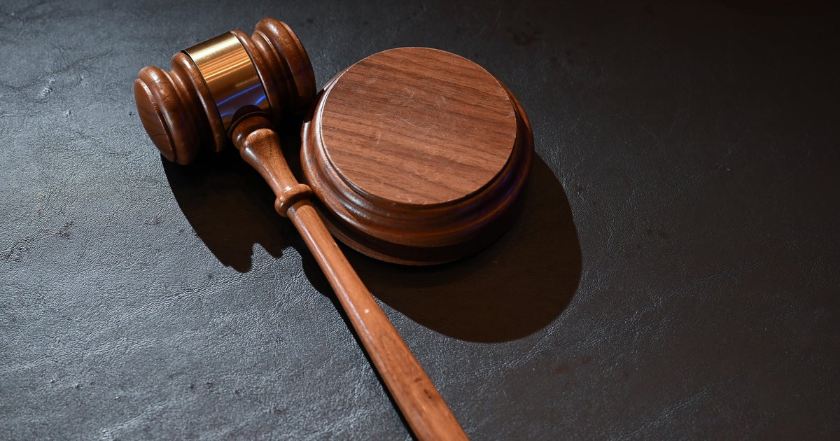 U.K. man accused of drugging, sexually abusing wife with 12 other men goes on trial