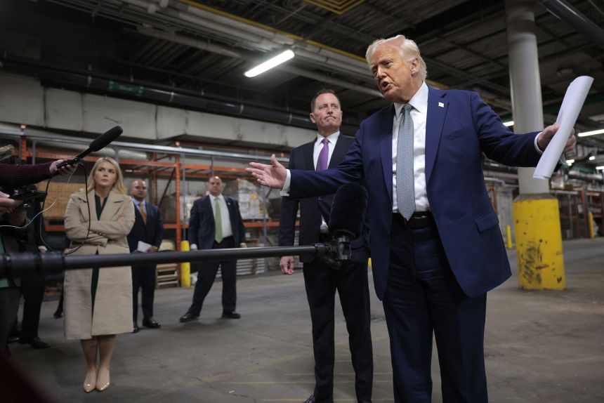 US President Donald Trump speaks to the media alongside Richard Grenell, President of The Kennedy Center Board of Trustees, during a guided tour of the John F. Kennedy Center for the Performing Arts before leading a board meeting on March 17, 2025.