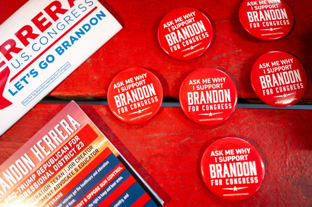 Pins for Republican congressional candidate Brandon Herrera are displayed during a campaign rally in Somerset, Texas, on February 26.